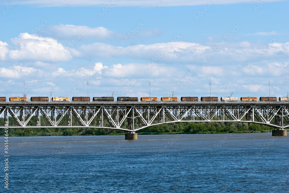 Obraz premium Bridge on the water in Płock