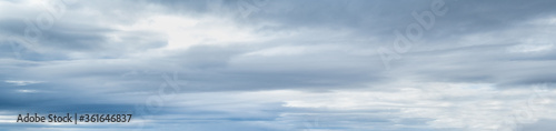 Clouds in the overcast sky view. Climate, environment and weather concept sky background. photo