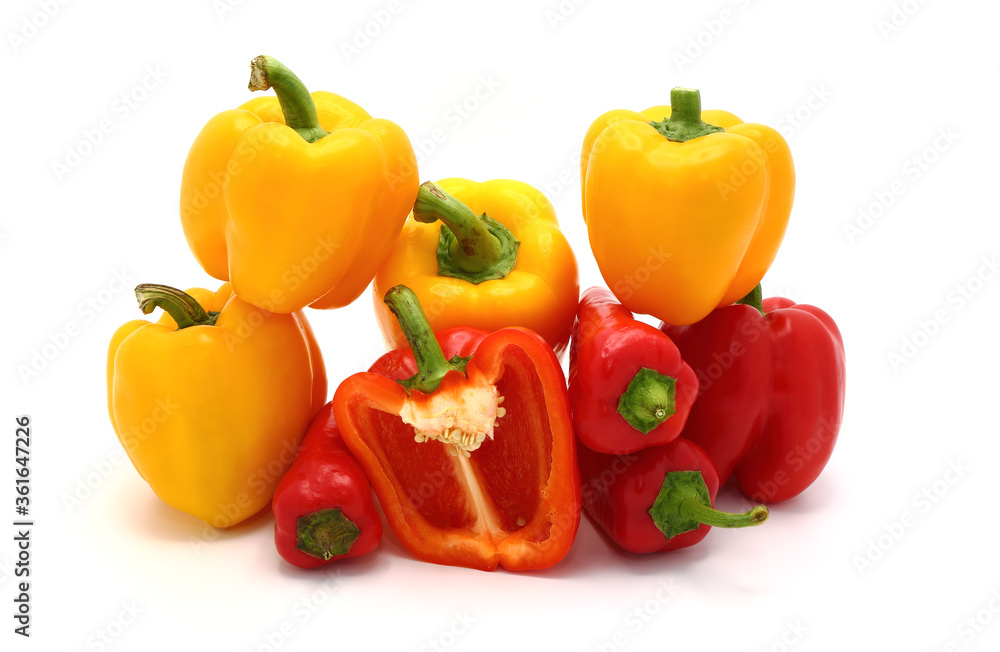 Composition of several sweet peppers and their halves of different colors on a light background. Natural product. Natural color. Close-up. Composition of several sweet peppers and their halves of different colors on a light background. Natural product. Natural color. Close-up.