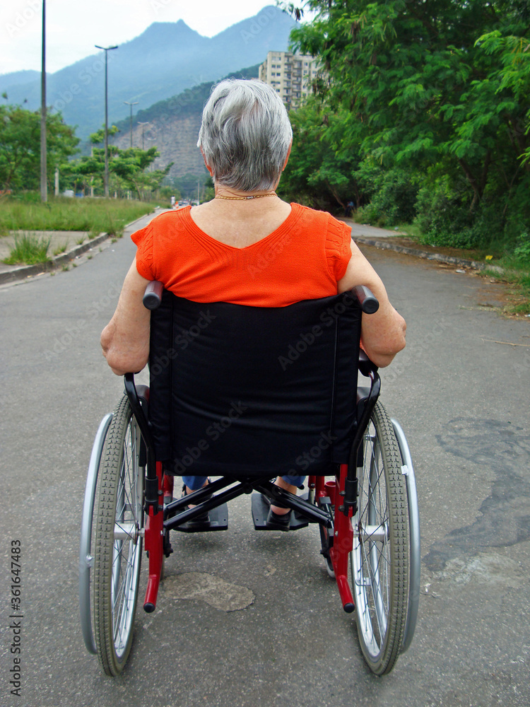 Obraz premium Disabled old woman on a wheelchair, Brazil