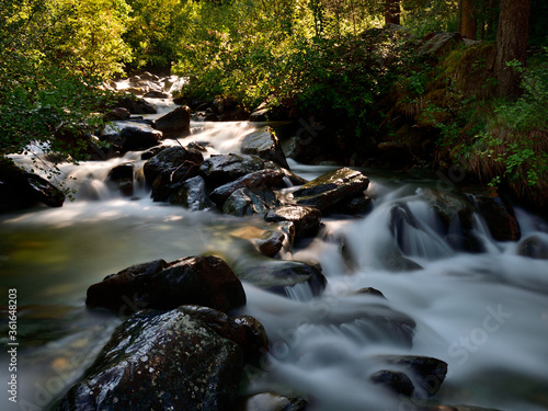 The power of the water. Long exposure of Laterna creek in Valmalenco. photo