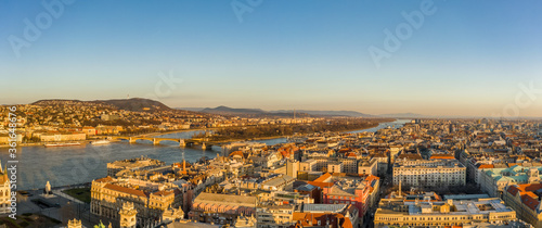 Panoramic aerial drone shot of Margaret Island in Danube river in Budapest sunrise morning glow