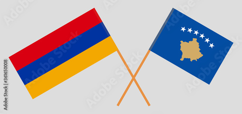 Crossed flags of Kosovo and Armenia photo