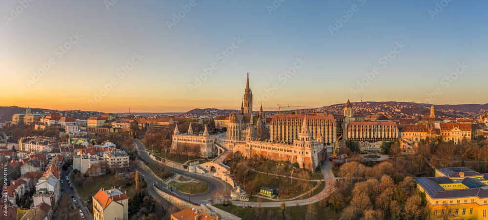 Panoramic aerial drone shot of Matthias churh on buda hill during Budapest sunrise