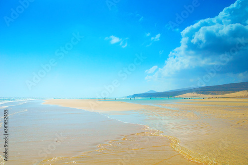 View on beautiful tropical sandy beach and blue sky on a sunny day