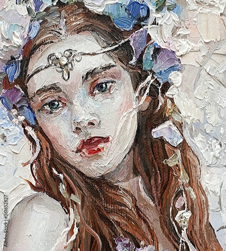Fototapeta Naklejka Na Ścianę i Meble -  Mysterious Fairy. Girl in authentic jewelry on her face and purple flower petals woven into her hair. Oil painting.