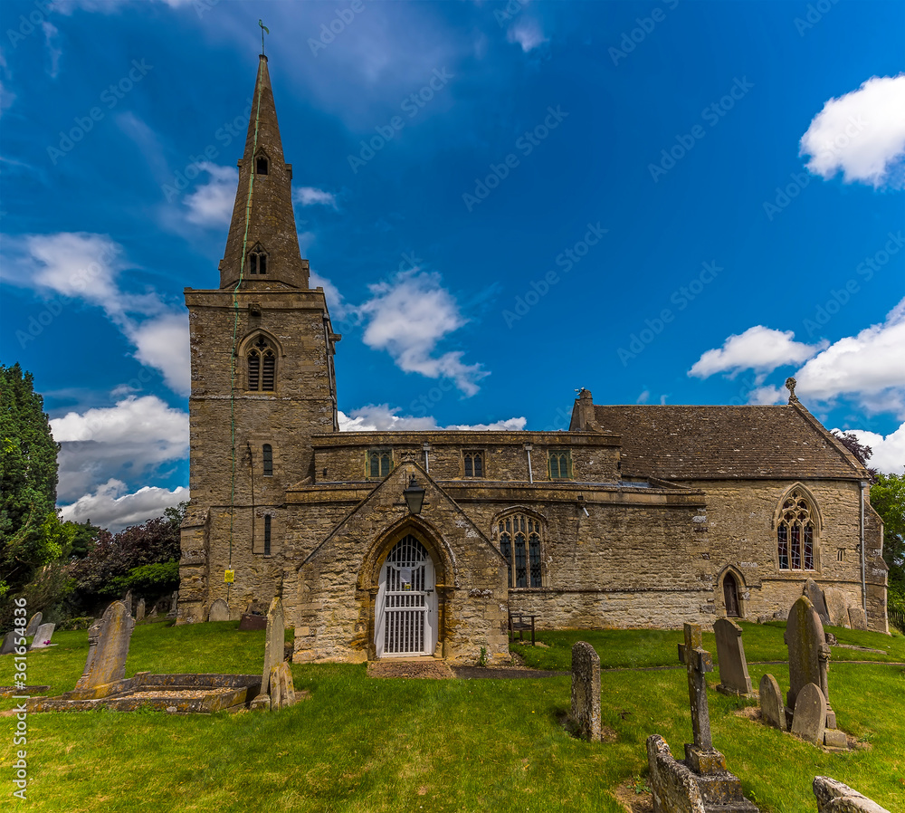 The view of the Church at Grafton Underwood, UK on a summers day