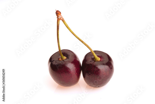 two cherries isolated on white background