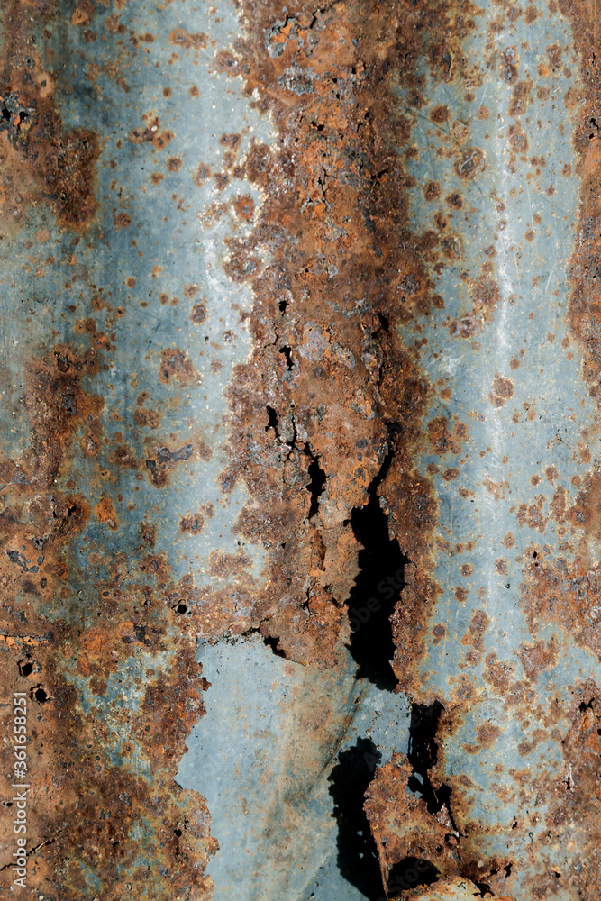 Old rusty zinc wall panel with rusty texture for background, Rusted galvanized iron plate vintage style decoration retro interior Old rusty zinc wall panel with rusty texture for background, Rusted galvanized iron plate vintage style decoration retro interior