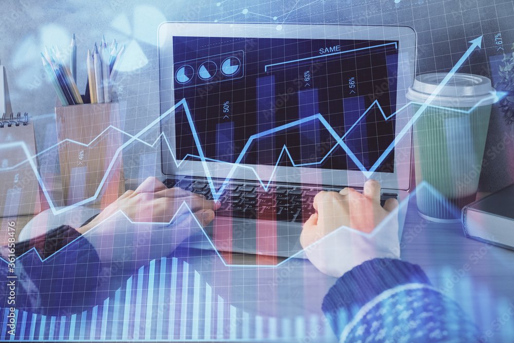 Double exposure of woman hands typing on computer and forex chart hologram drawing. Stock market invest concept. Double exposure of woman hands typing on computer and forex chart hologram drawing. Stock market invest concept.