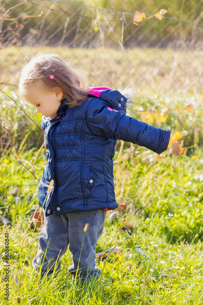 child on the grass child on the grass