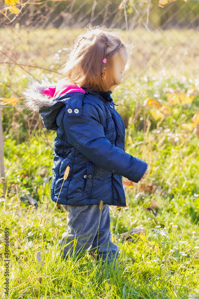child on the grass
