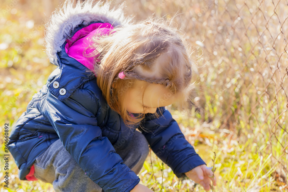 child on the grass