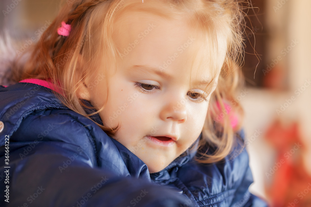 child in a jacket