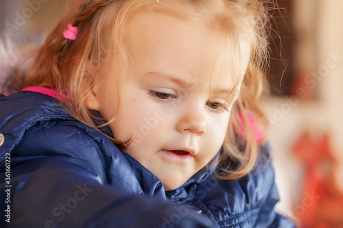 Obraz na płótnie child in a jacket w salonie