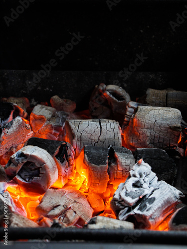 Embers glowing in barbecue