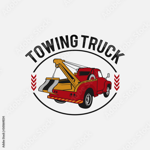 car tow truck emblems, labels and design elements,pickup truck logos, emblems and icons. Car service logotype design. Tow and wrecker truck. Pickup with snow plow.
