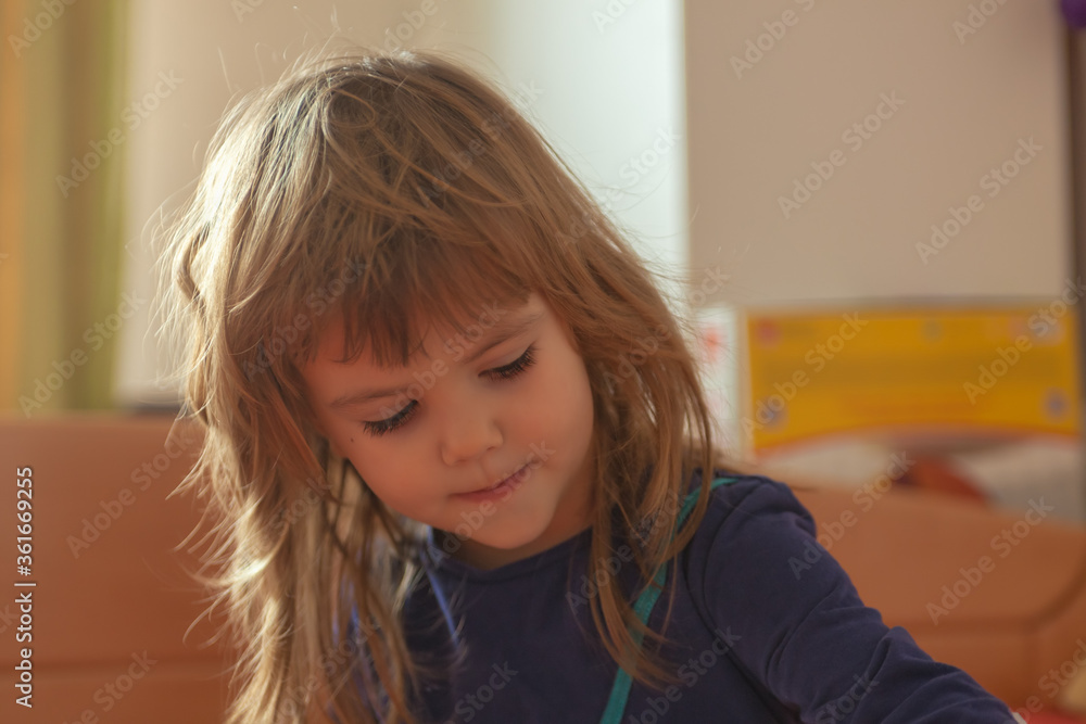 a cute girl playing at home a cute girl playing at home