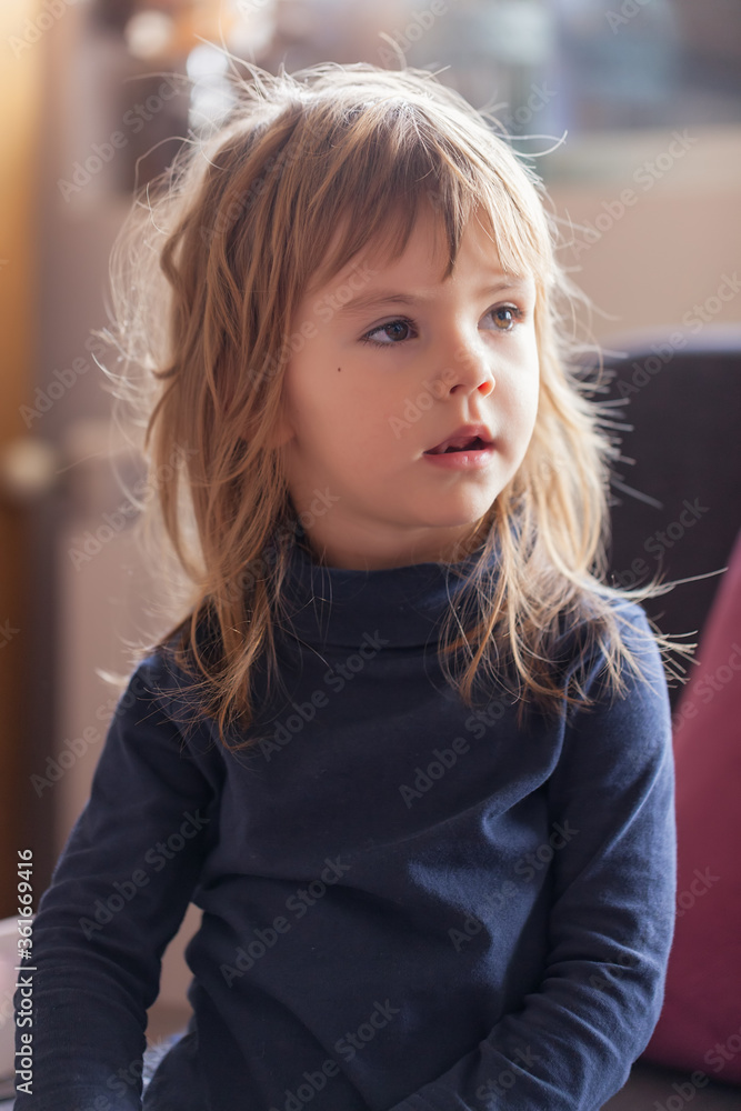 a cute girl playing at home