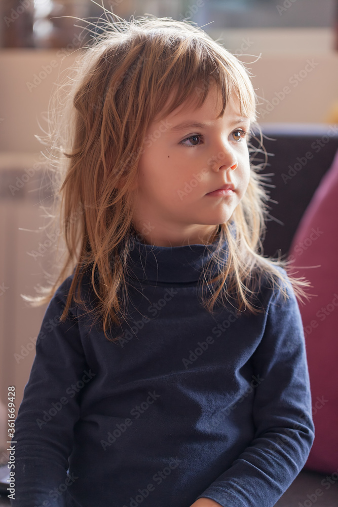 a cute girl playing at home
