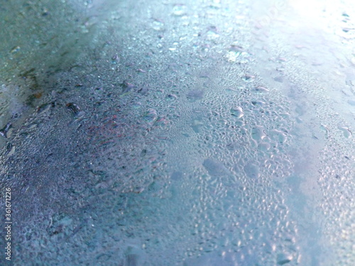 Dew on the glass surface Use as a background in the morning.