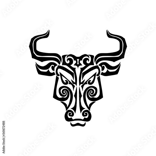 Bull is symbol of 2021 New Year. Bull head stylized Maori face tattoo. Vector illustration isolated on white background.