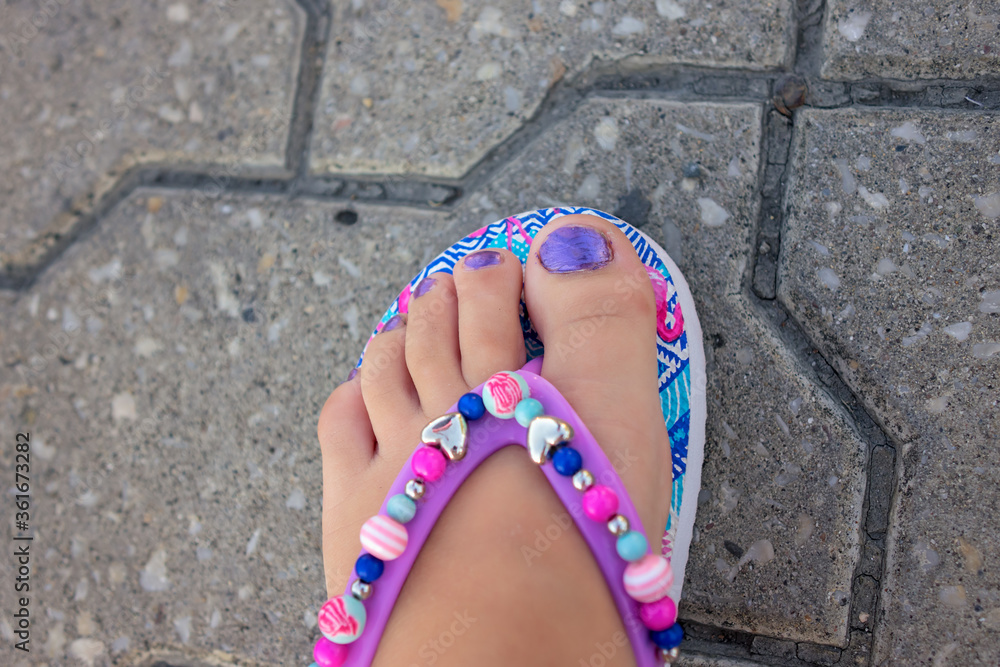 small feet in sandals