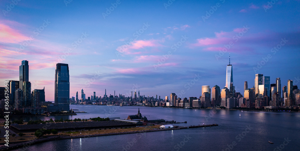 Amazing Panorama view of the Skyline of Manhattan and Jersey City, New York City, United States. Shot from Hudson River 