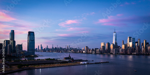 Amazing Panorama view of the Skyline of Manhattan and Jersey City, New York City, United States. Shot from Hudson River 