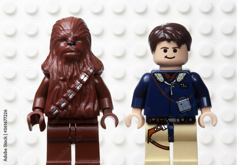 NEW YORK USA - MARCH 30 2020 - Lego style mini figure of Han Solo and the  Wookiee sidekick Chewbacca against a white Lego board Stock Photo | Adobe  Stock