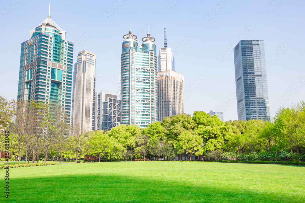 Central Park in Lujiazui, a big lawn in front of the modern skyscrapers.