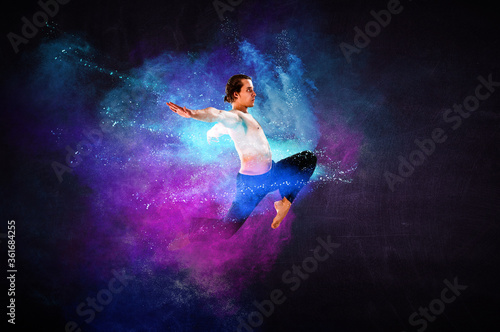 Male dancer against colourf...