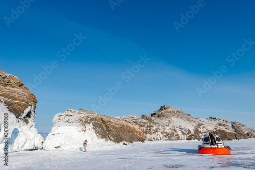 Fototapeta Naklejka Na Ścianę i Meble -  Hovercraft on the lake in winter