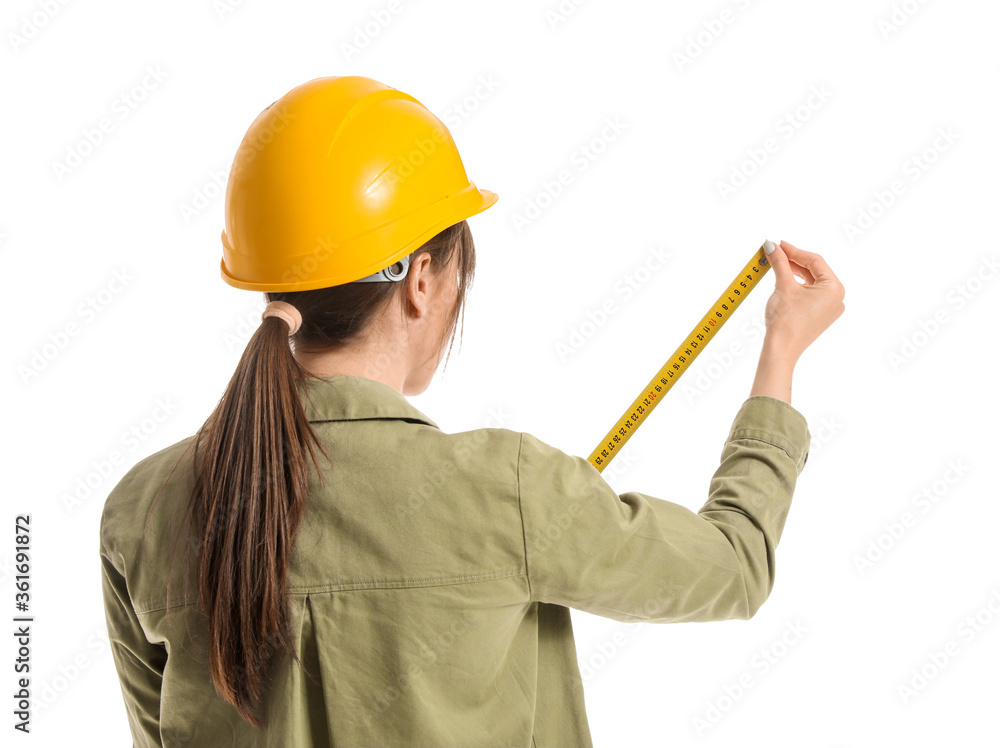 Young woman with tape measure on white background Young woman with tape measure on white background