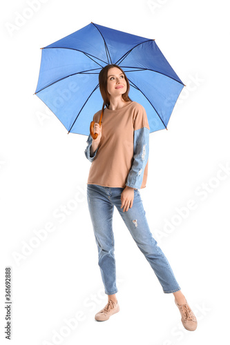 Beautiful woman with umbrella on white background