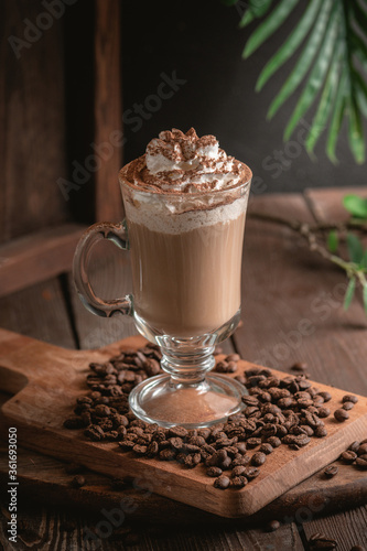 Iced latte coffee with whipped cream