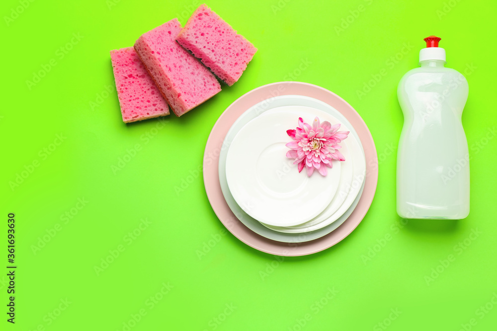 Composition with clean dishes on color background Composition with clean dishes on color background