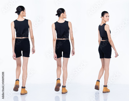 Asian Woman Full length walk turn back wear black vast short pants