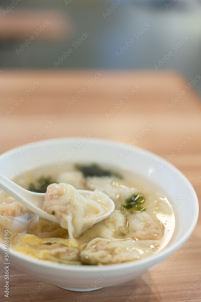 Wonton soup, Chinese traditional food with boiled meat filled wonton and seaweed soup. Wonton soup, Chinese traditional food with boiled meat filled wonton and seaweed soup.