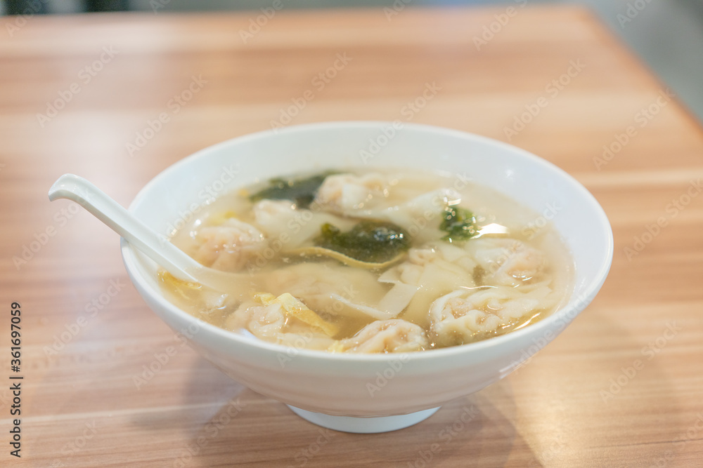 Wonton soup, Chinese traditional food with boiled meat filled wonton and seaweed soup. Wonton soup, Chinese traditional food with boiled meat filled wonton and seaweed soup.