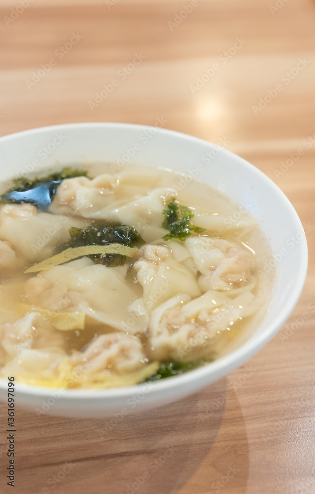 Wonton soup, Chinese traditional food with boiled meat filled wonton and seaweed soup. Wonton soup, Chinese traditional food with boiled meat filled wonton and seaweed soup.