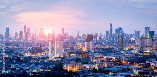 Cityscape view of Bangkok modern office with sunset sky