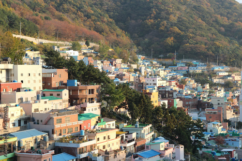 Gamcheon Culture Village which is houses built in staircase-fashion on the foothills of a coastal mountain during sunset in autumn, Busan, South Korea © Crystaltmc