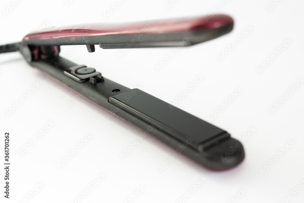 hair iron on a white background hair iron on a white background