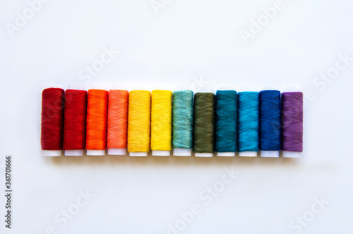Spools of thread on the colors of the rainbow