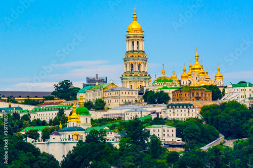 View on buildings of the Kiev Pechersk Lavra and Great bell tower from left bank of river Dnieper in Kiev, Ukraine photo