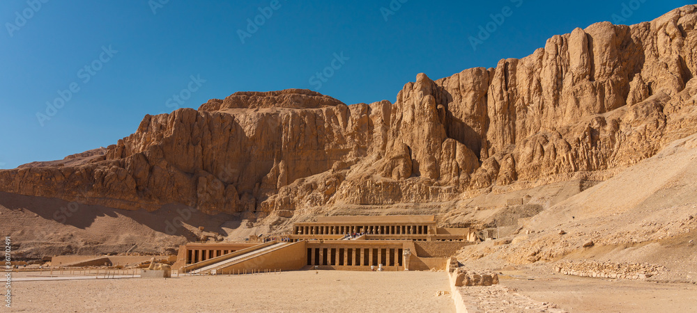 Temple of Queen Hatshepsut in Luxor city, upper Egypt. Panoramic banner portion - obrazy, fototapety, plakaty 