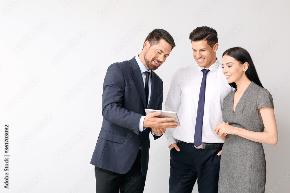 Group of business people on light background Group of business people on light background