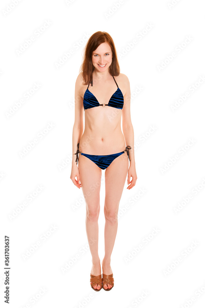 Portrait of a beautiful young woan wearing a colorful bikini, isolated on white studio background Portrait of a beautiful young woan wearing a colorful bikini, isolated on white studio background