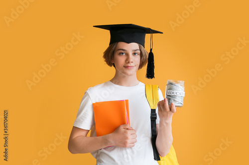 Teenage boy with savings fo...